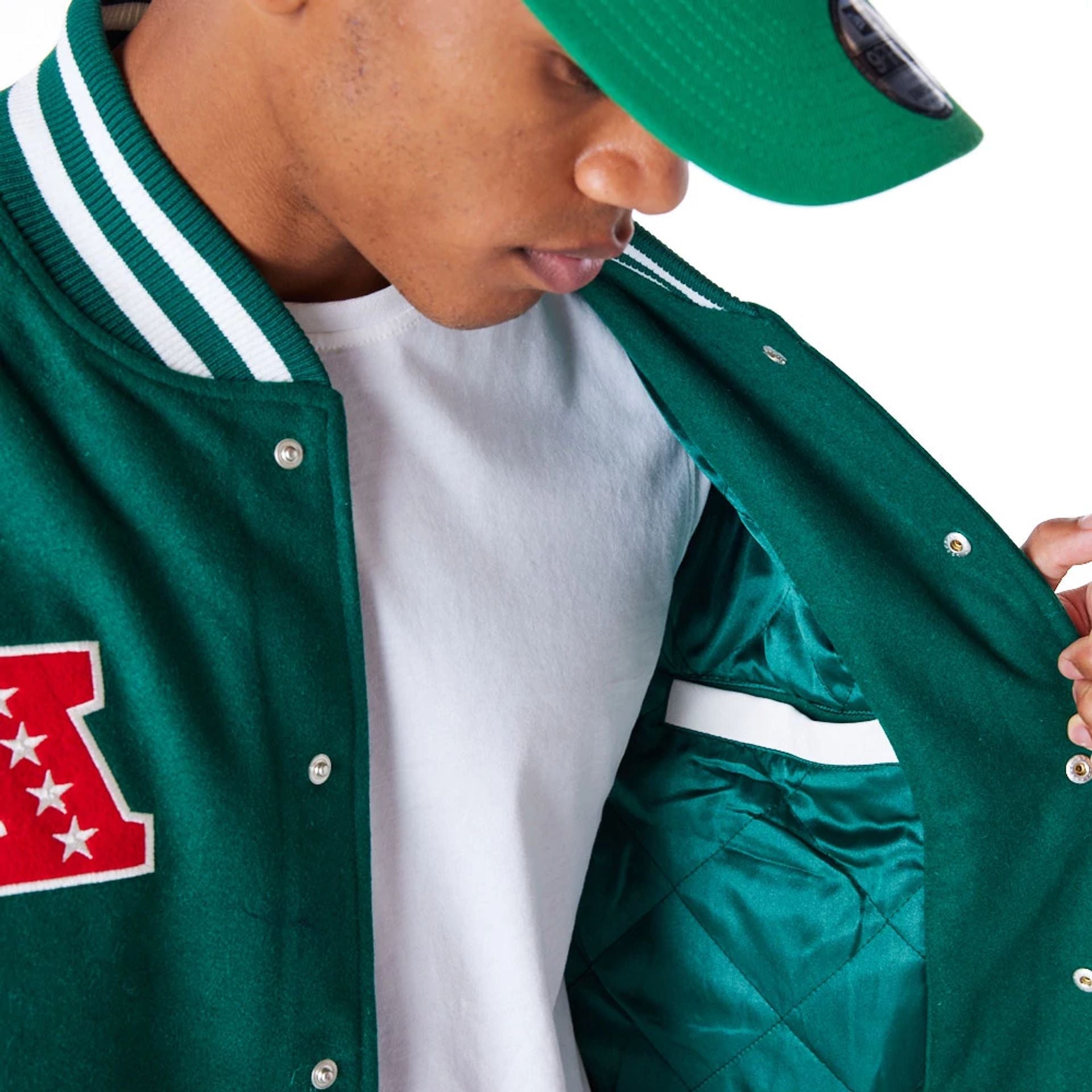 The Male model is wearing New York Jets NFL Patch Green Varsity Jacket 2