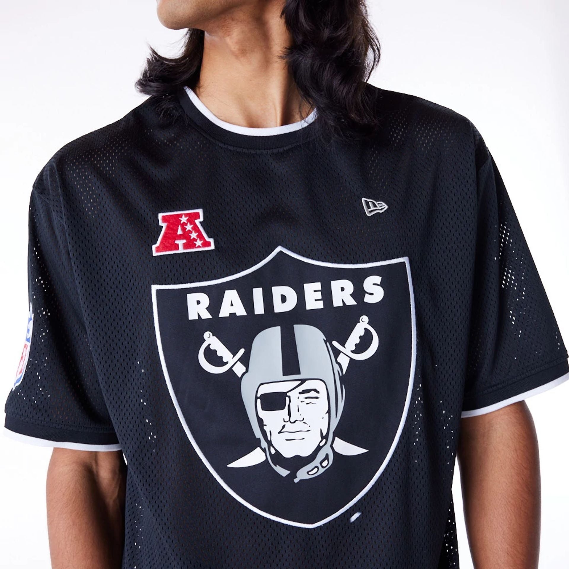 The Male model is wearing Las Vegas Raiders NFL Mesh Black Oversized T-Shirt 6