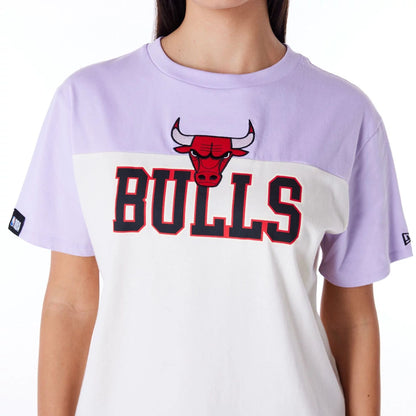 The Female model is wearing Chicago Bulls Womens NBA Pastel Purple Oversized T-Shirt 6