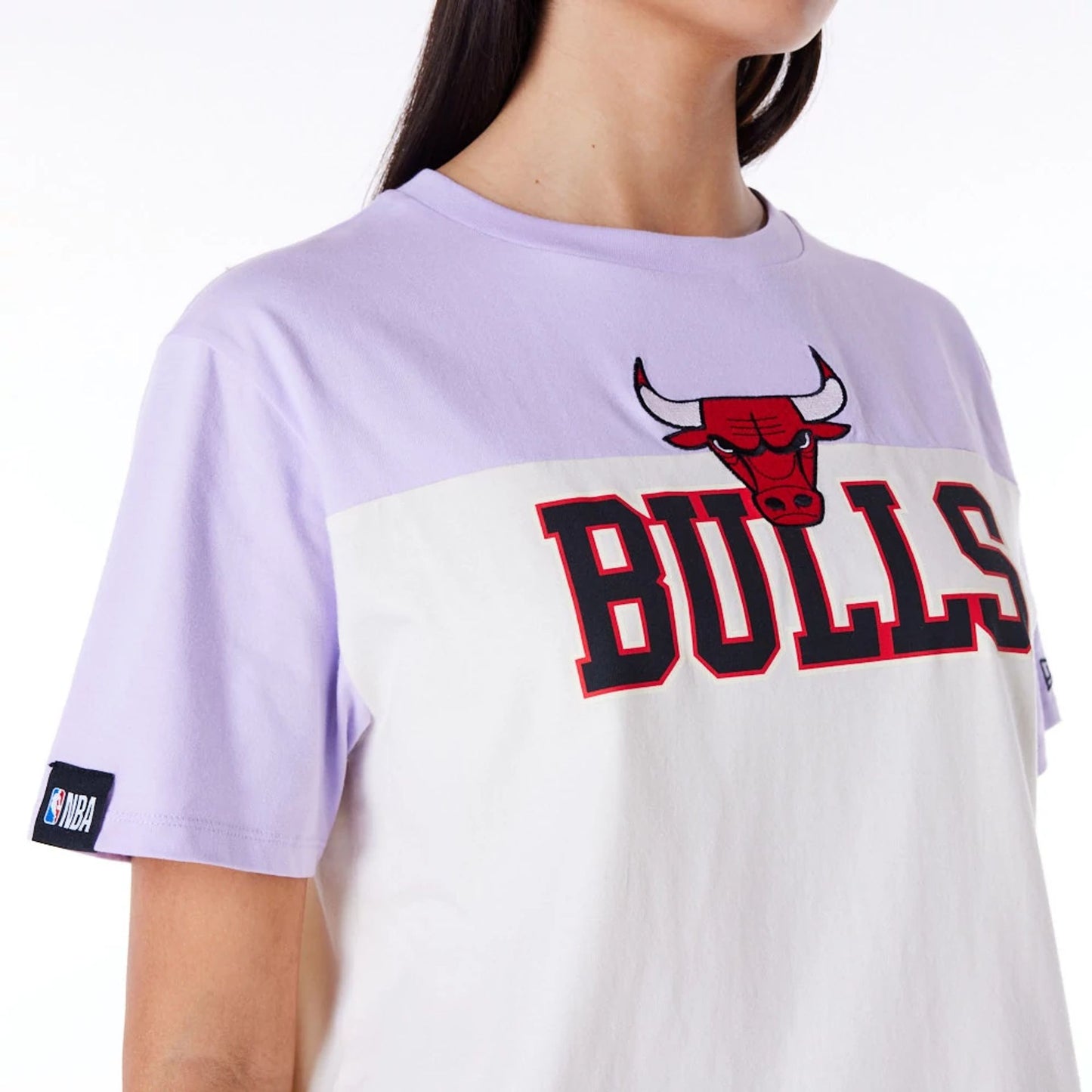 The Female model is wearing Chicago Bulls Womens NBA Pastel Purple Oversized T-Shirt 3