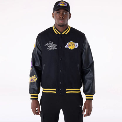 The Male model is wearing LA Lakers NBA Patch Black Varsity Jacket 1