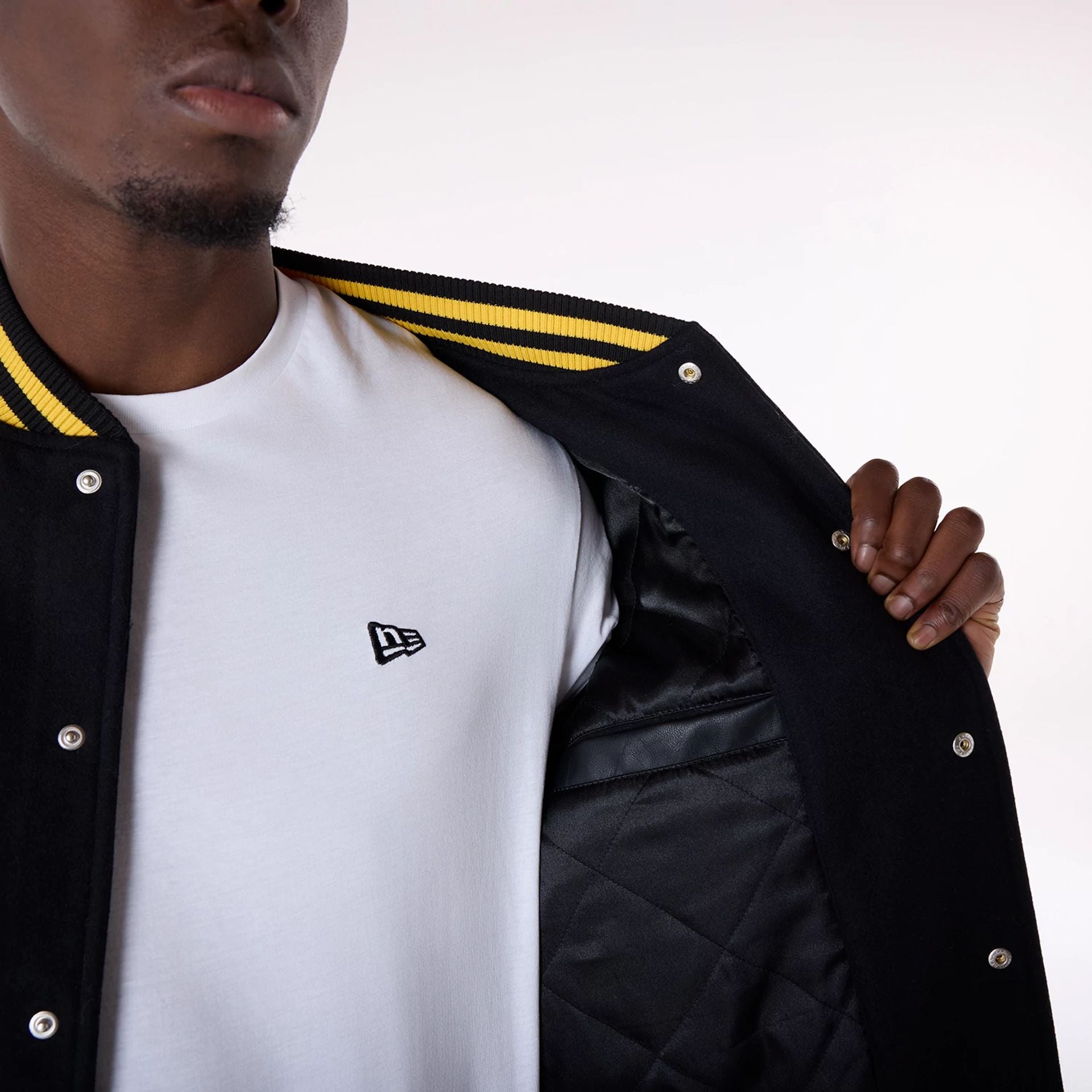 The Male model is wearing LA Lakers NBA Patch Black Varsity Jacket 4