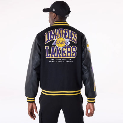 The Male model is wearing LA Lakers NBA Patch Black Varsity Jacket 3