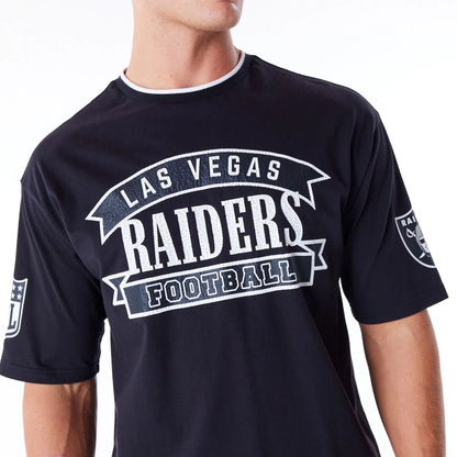 The Male model is wearing Las Vegas Raiders NFL Graphic Black Oversized T-Shirt 7