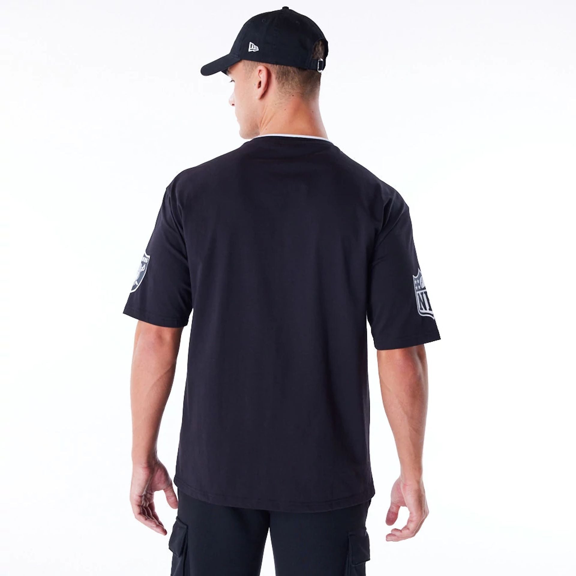 The Male model is wearing Las Vegas Raiders NFL Graphic Black Oversized T-Shirt 2