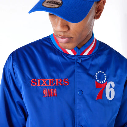 The Male model is wearing Philadelphia 76ers NBA Satin Blue Bomber Jacket 8