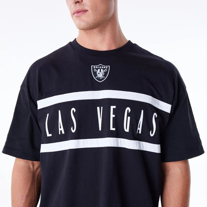 The Male model is wearing Las Vegas Raiders NFL Drop Shoulder Black Drop Shoulder T-Shirt 4