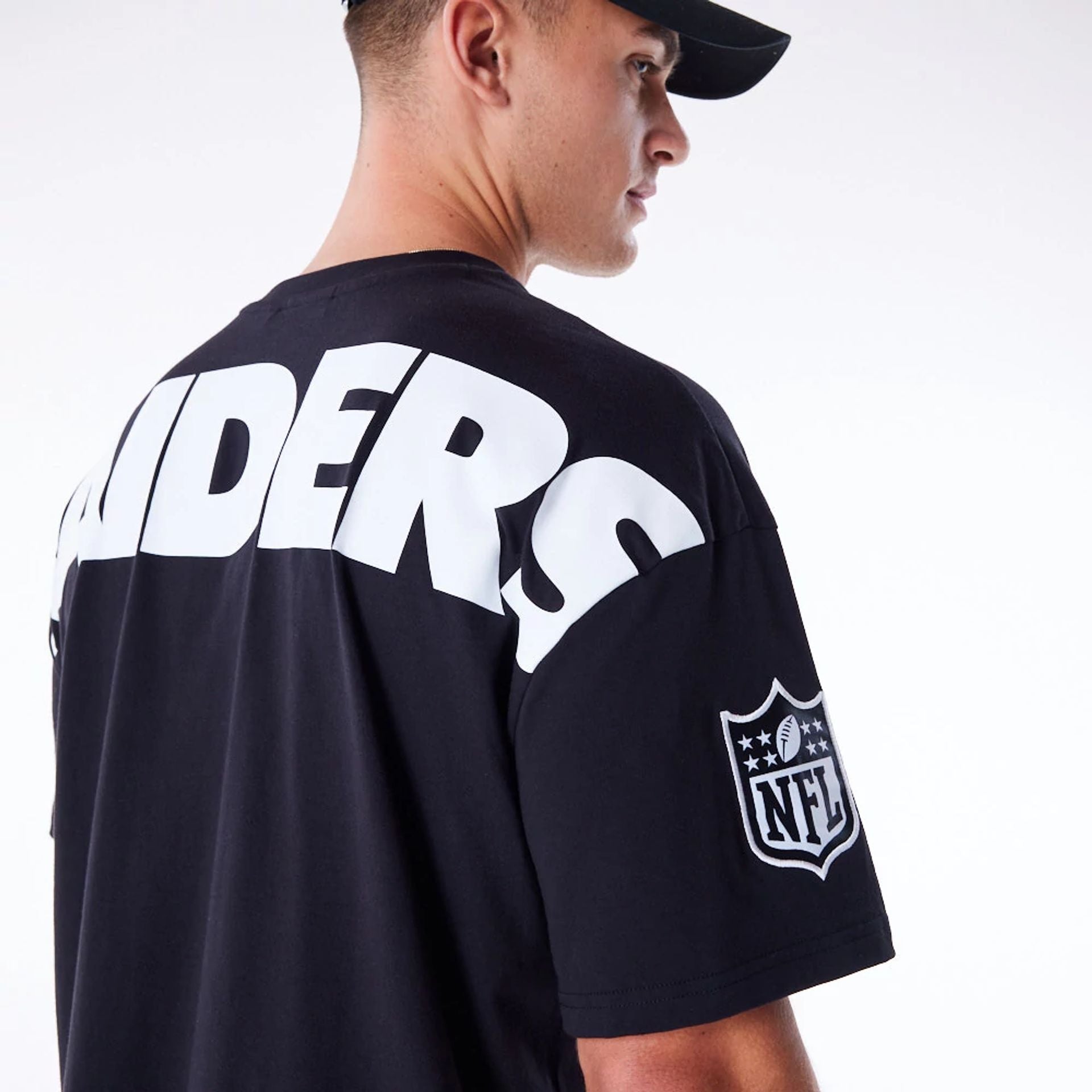 The Male model is wearing Las Vegas Raiders NFL Drop Shoulder Black Drop Shoulder T-Shirt 6