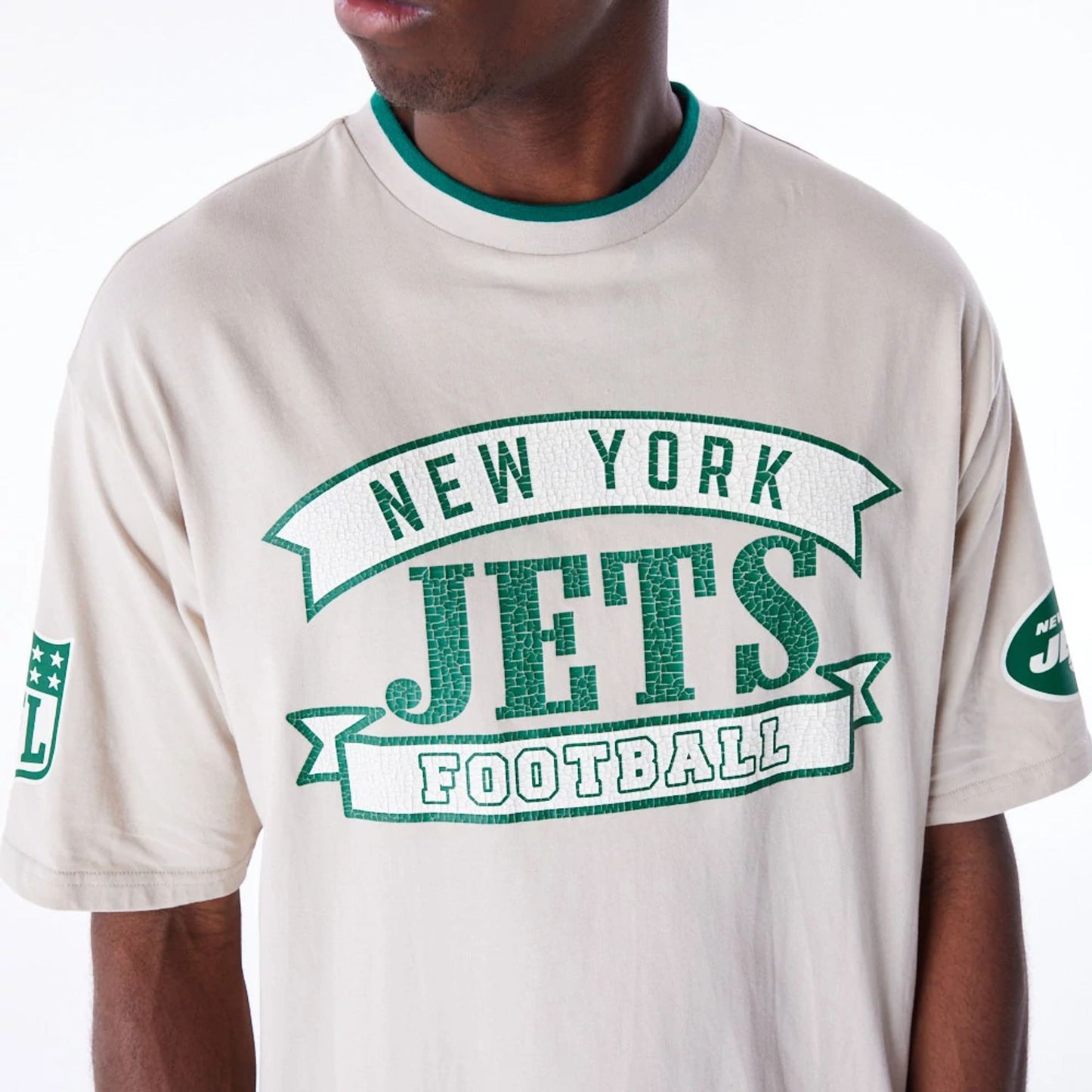 The Male model is wearing New York Jets NFL Graphic Open White Oversized T-Shirt 5