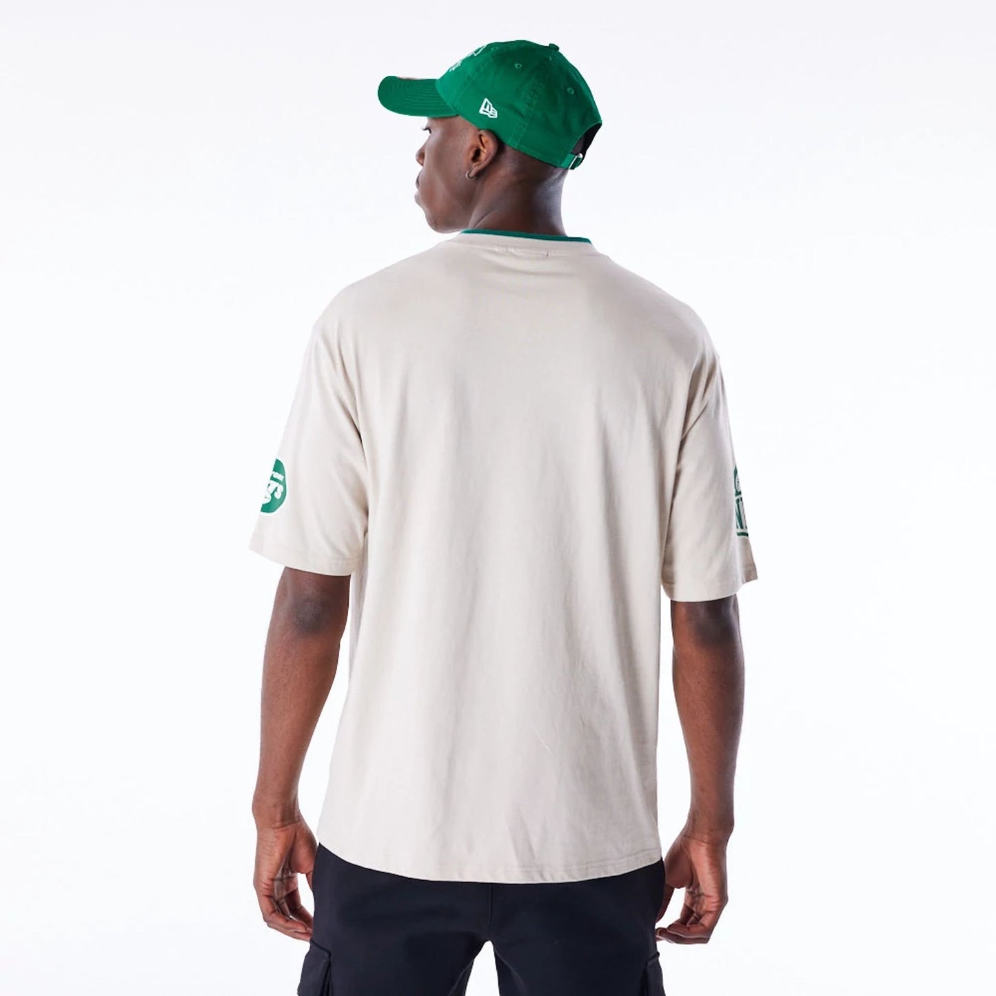 The Male model is wearing New York Jets NFL Graphic Open White Oversized T-Shirt 3