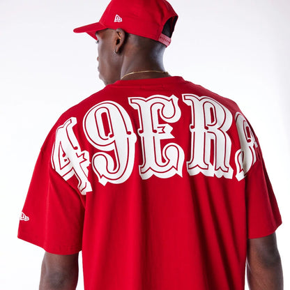 The Male model is wearing San Francisco 49ers NFL Drop Shoulder Red Drop Shoulder T-Shirt 6