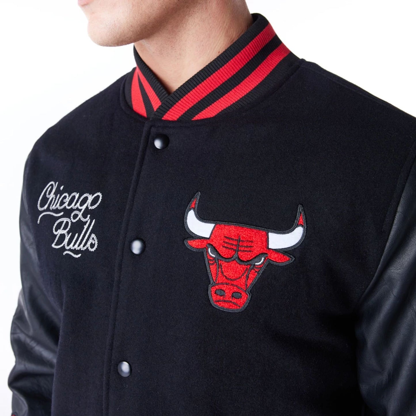 The Male model is wearing Chicago Bulls NBA Patch Black and Red Varsity Jacket 3