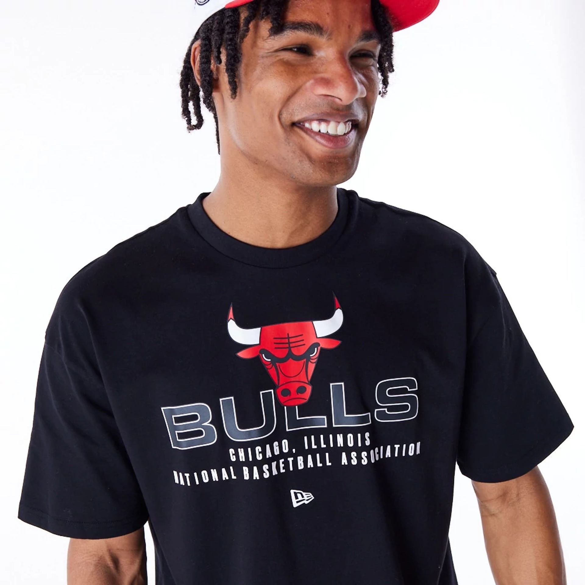 The Male model is wearing Chicago Bulls NBA Tech Black Oversized T-Shirt 7