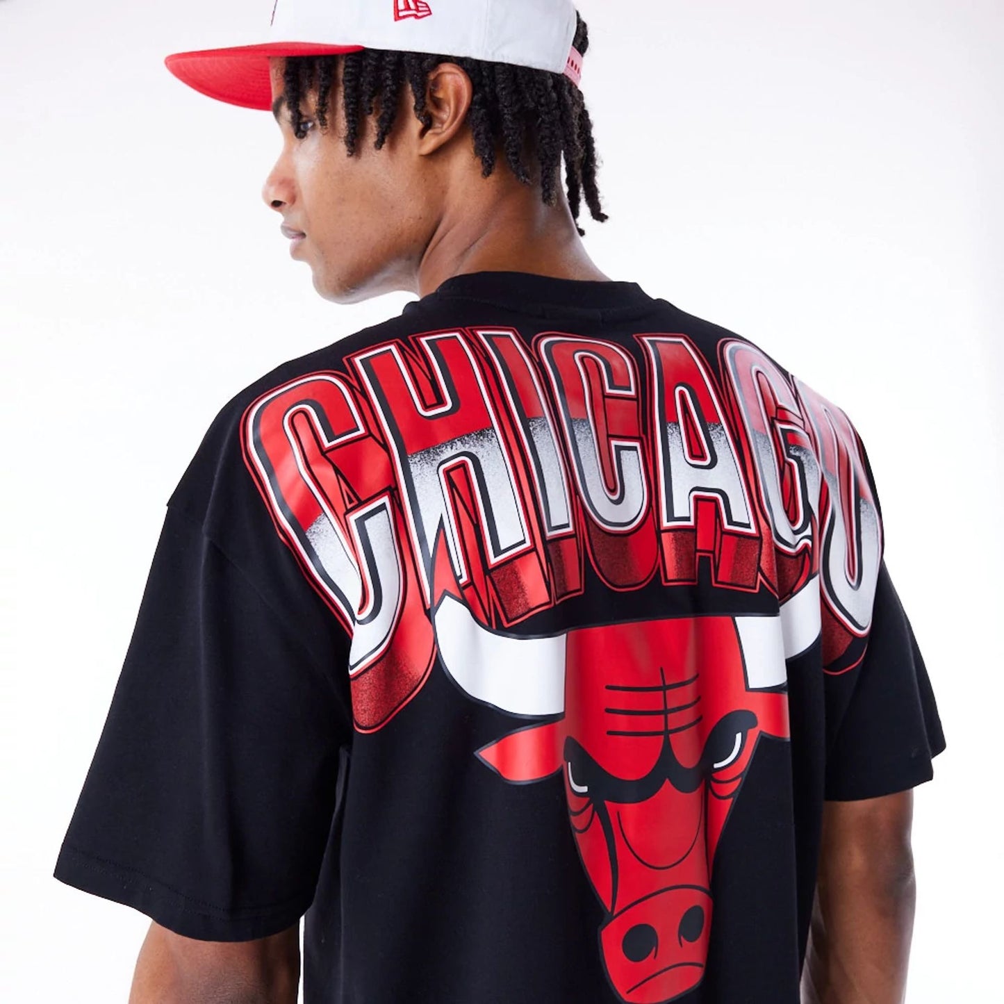 The Male model is wearing Chicago Bulls NBA Tech Black Oversized T-Shirt 4