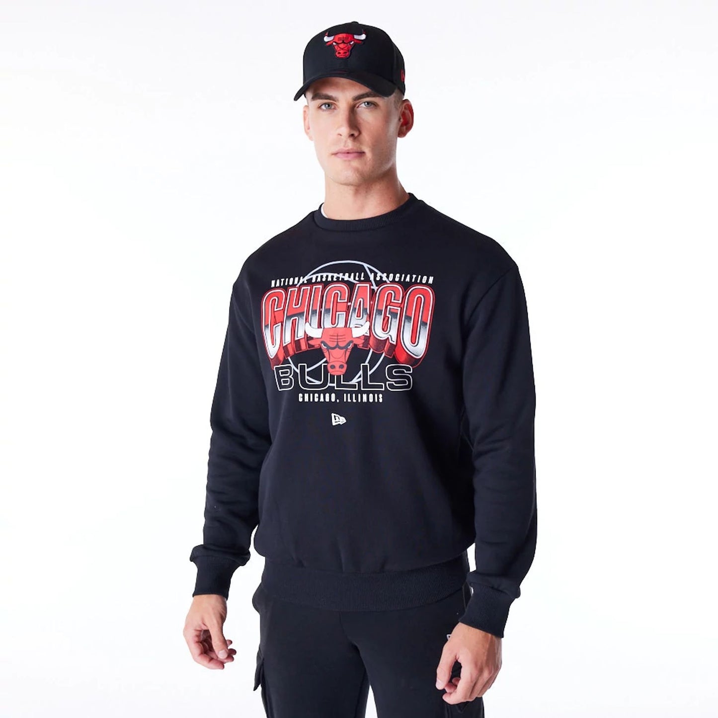 The Male model is wearing Chicago Bulls NBA Tech Black Crew Neck Sweatshirt 5