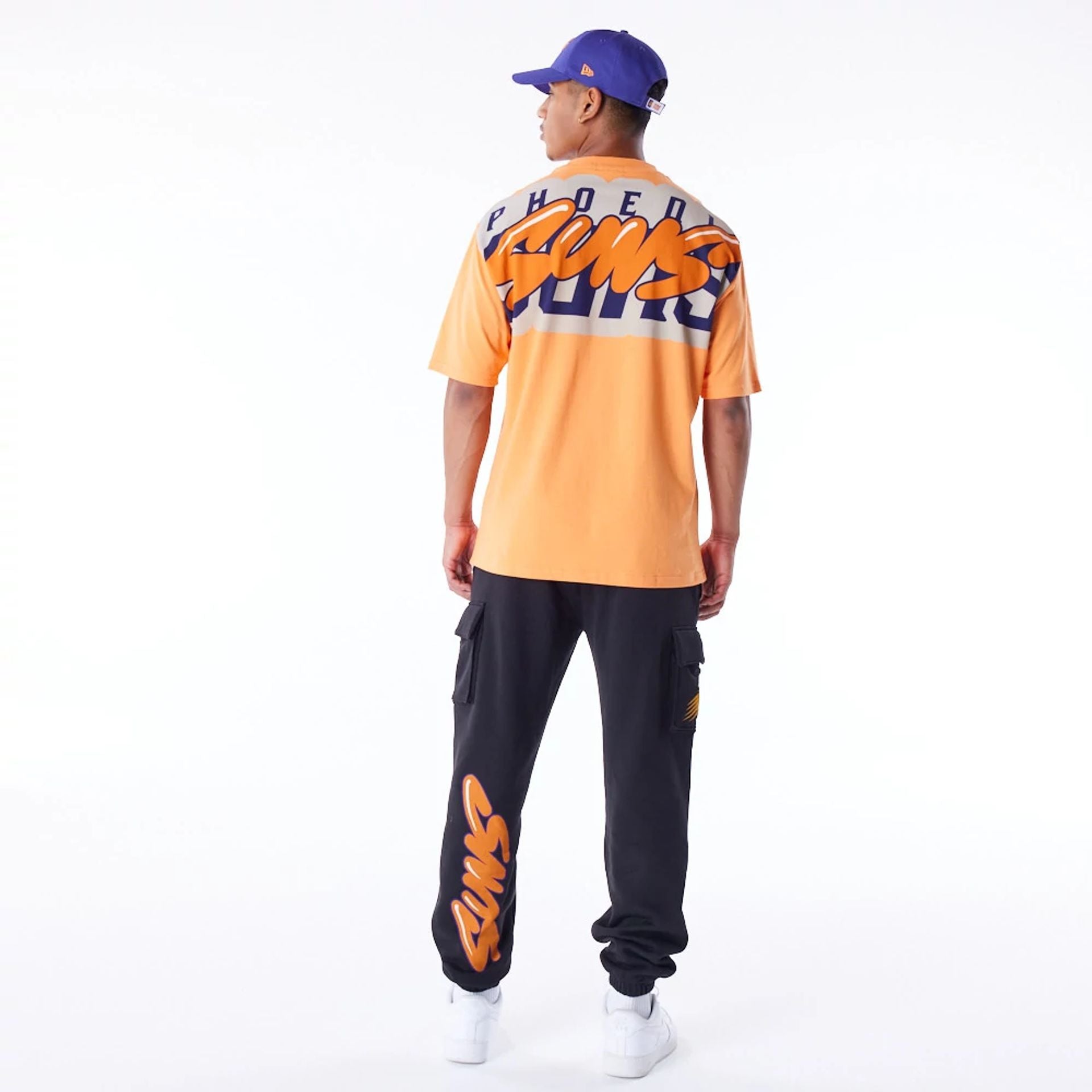 The Male model is wearing Phoenix Suns NBA Wordmark Orange Oversized T-Shirt 2