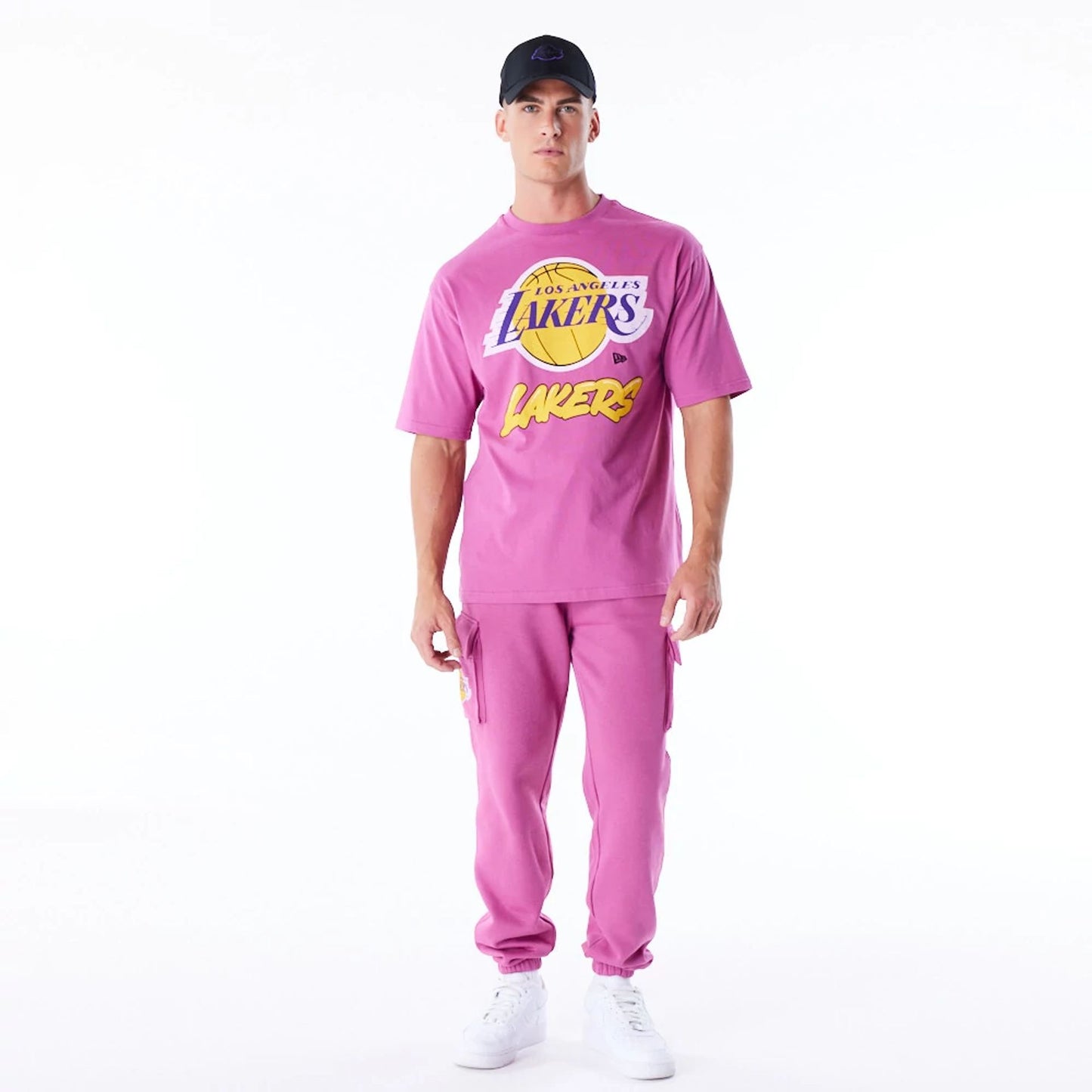 The Male model is wearing LA Lakers NBA Wordmark Purple Oversized T-Shirt 5