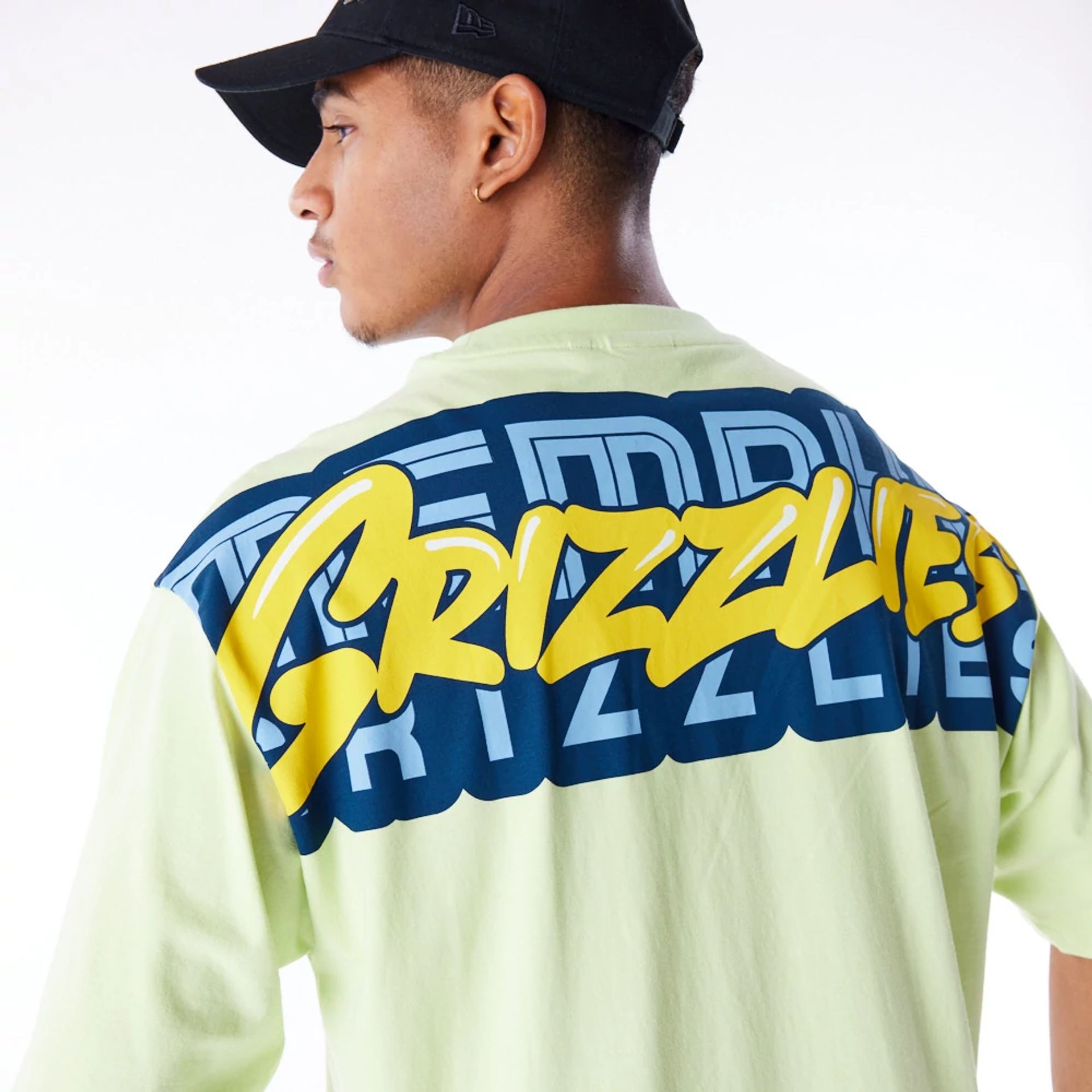 The Male model is wearing Memphis Grizzlies NBA Wordmark Pastel Green Oversized T-Shirt 3