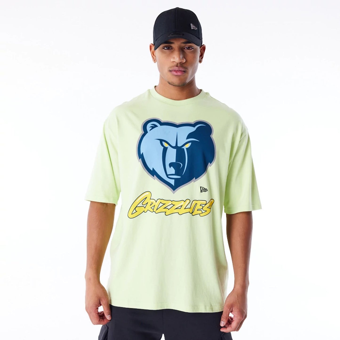 The Male model is wearing Memphis Grizzlies NBA Wordmark Pastel Green Oversized T-Shirt 1