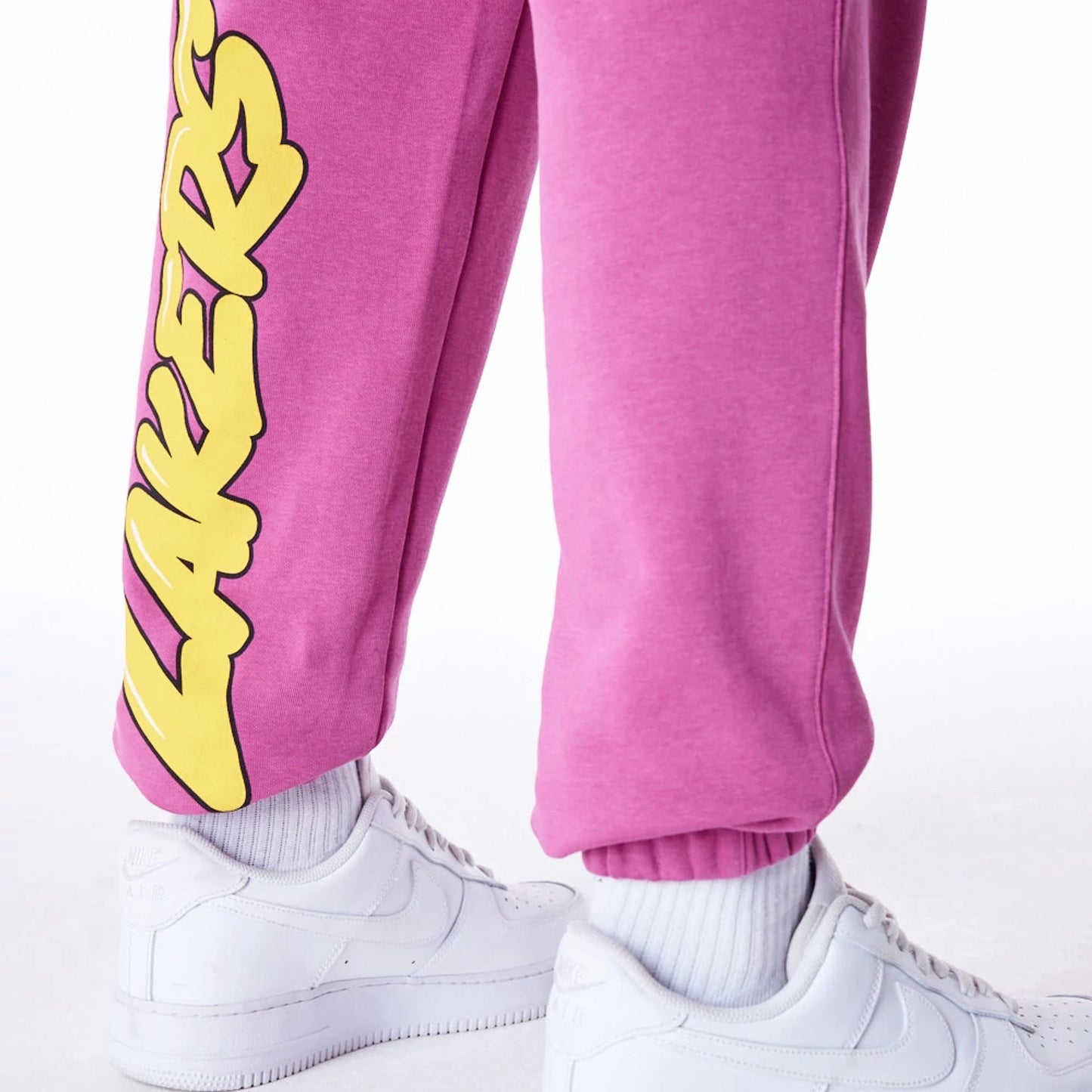 The Male model is wearing LA Lakers NBA Wordmark Purple Fleece Cargo Joggers 5