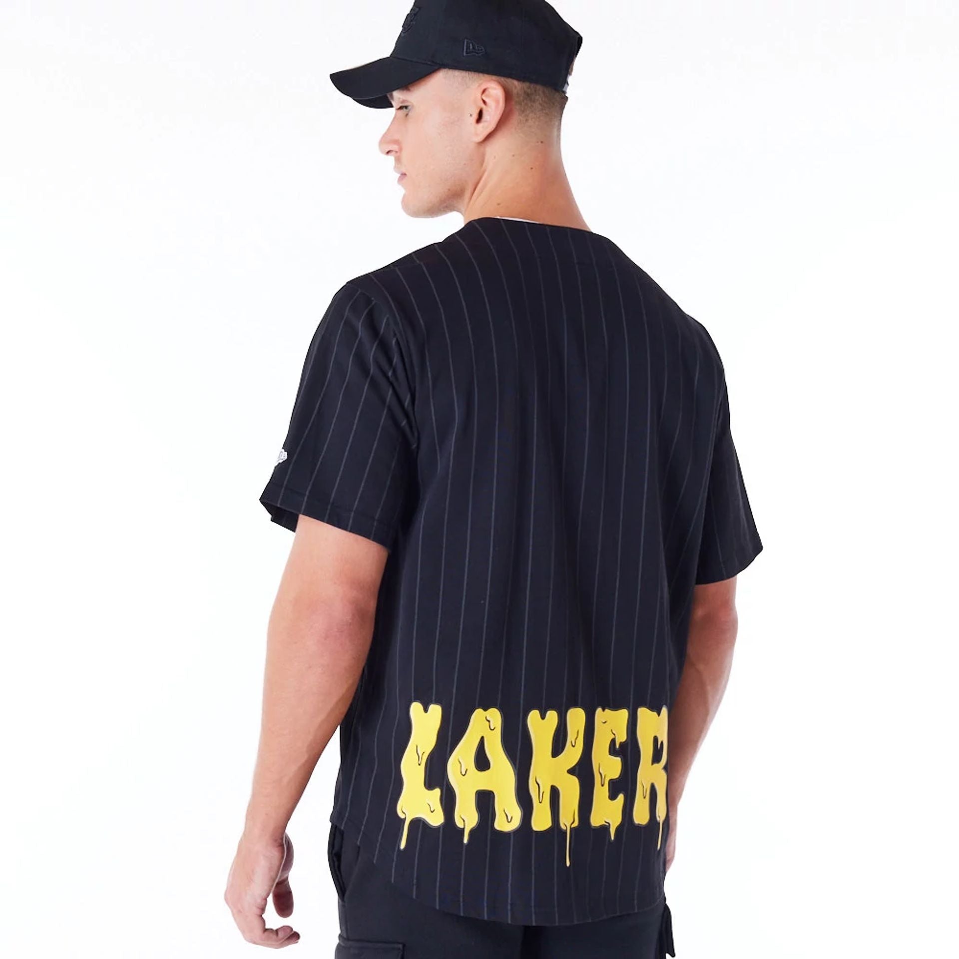 The Male model is wearing LA Lakers NBA Graphic Black Jersey 3