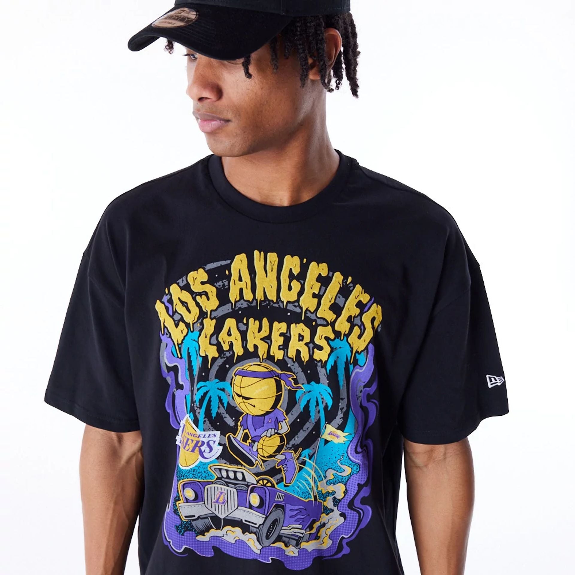 The Male model is wearing LA Lakers Graphic Black Drop Shoulder T-Shirt 1