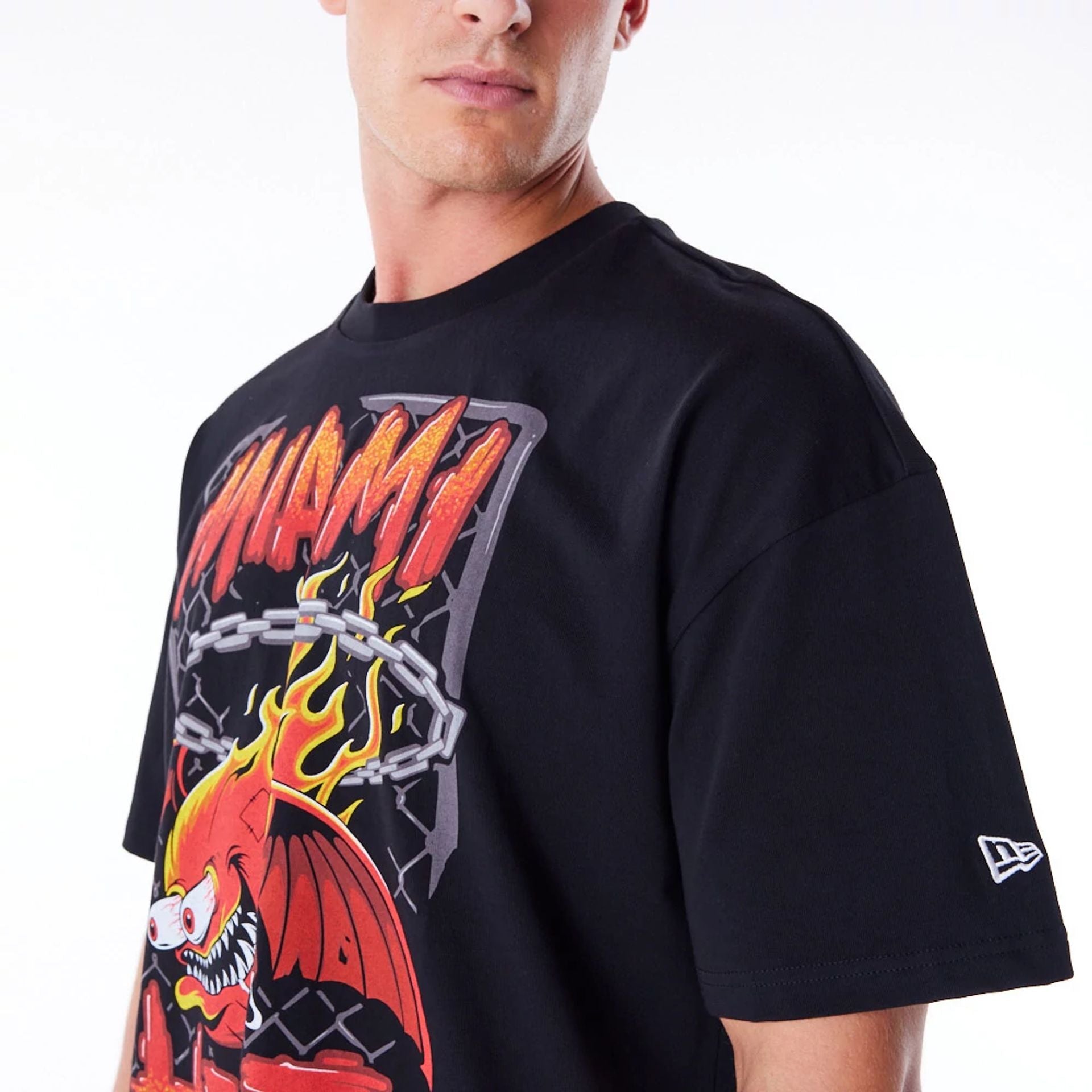 The Male model is wearing Miami Heat Graphic Black Drop Shoulder T-Shirt 4