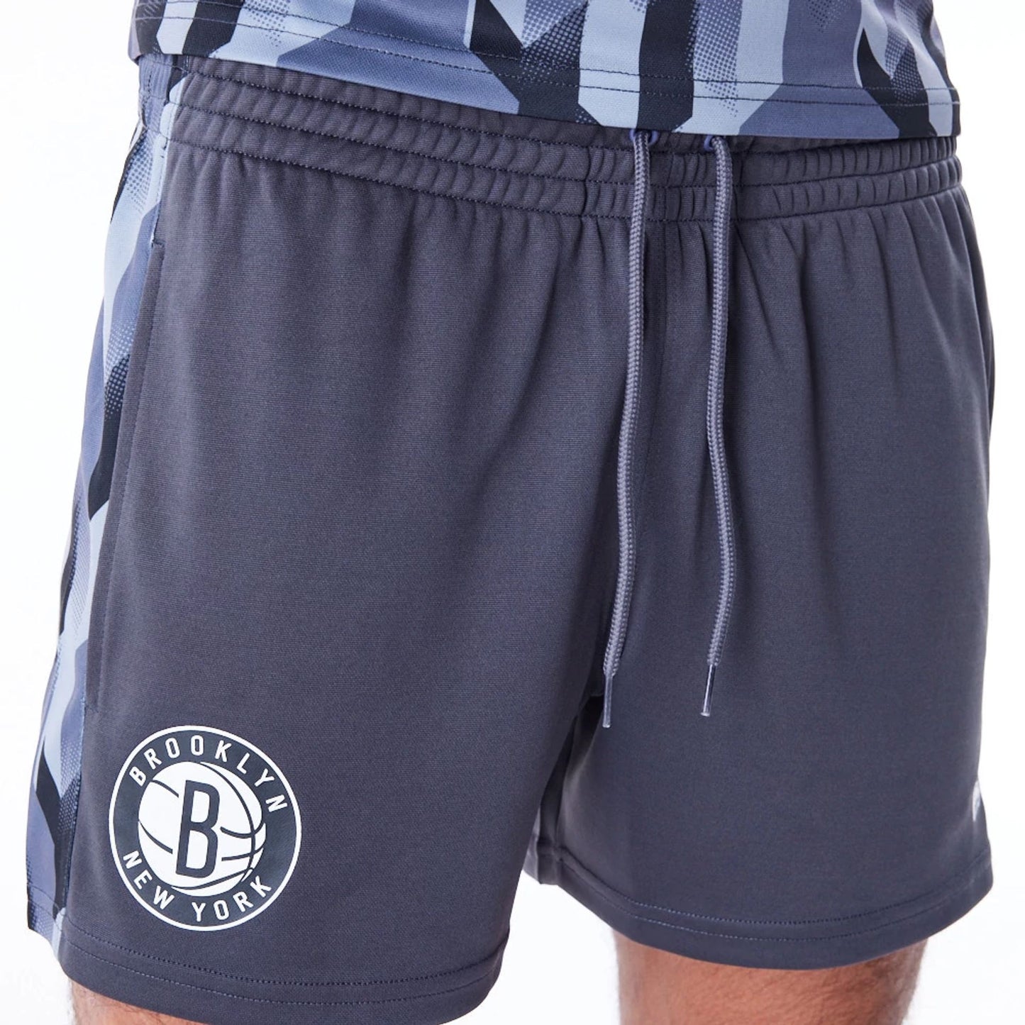 The Male model is wearing Brooklyn Nets NBA Soccer Dark Grey Short Shorts 3