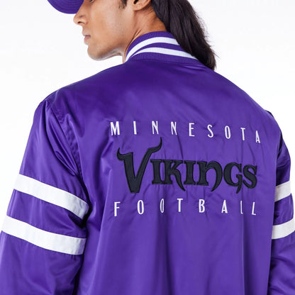 The Male model is wearing Minnesota Vikings NFL Satin Purple Bomber Jacket 6