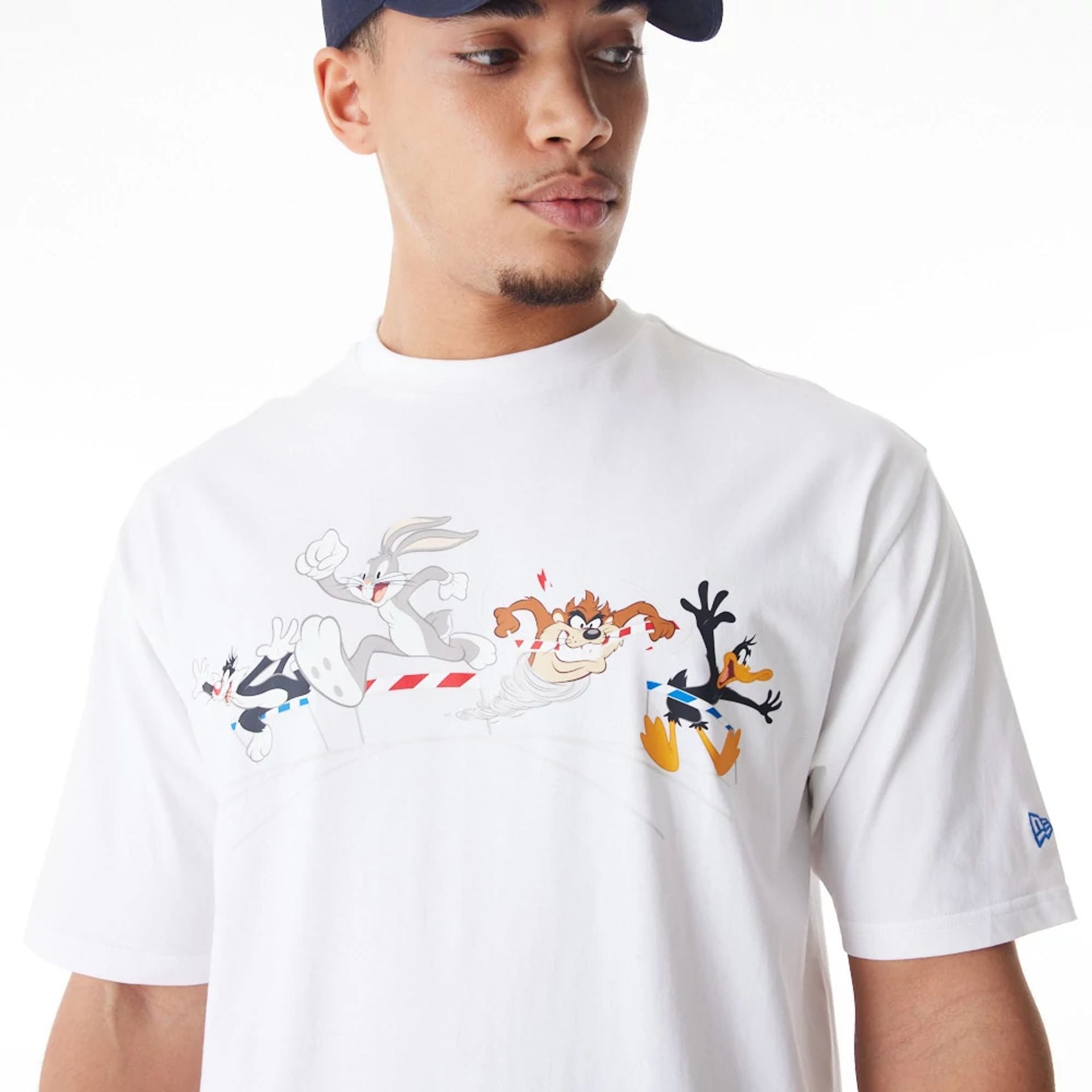 The Male model is wearing Multi Character Team Looney Tunes White Oversized T-Shirt 2