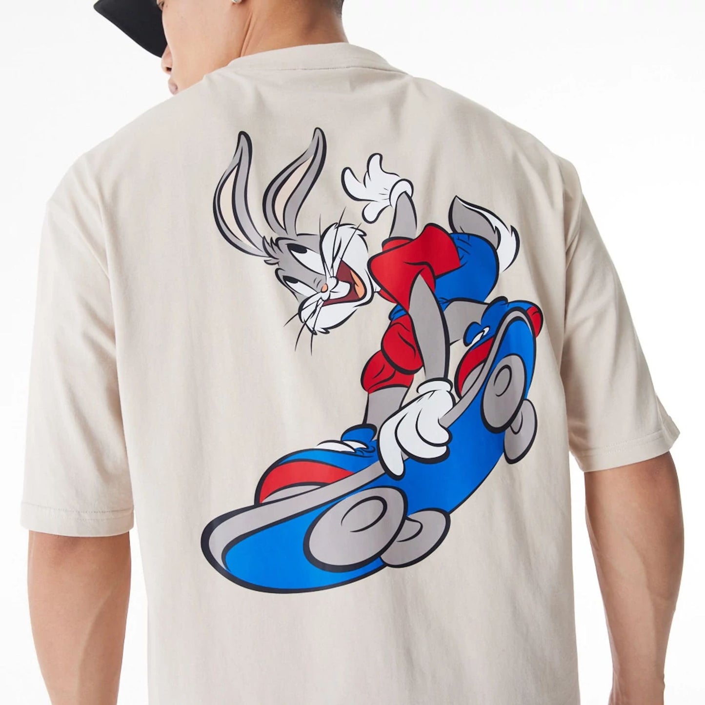 The Male model is wearing Bugs Bunny Team Looney Tunes Stone Oversized T-Shirt 7