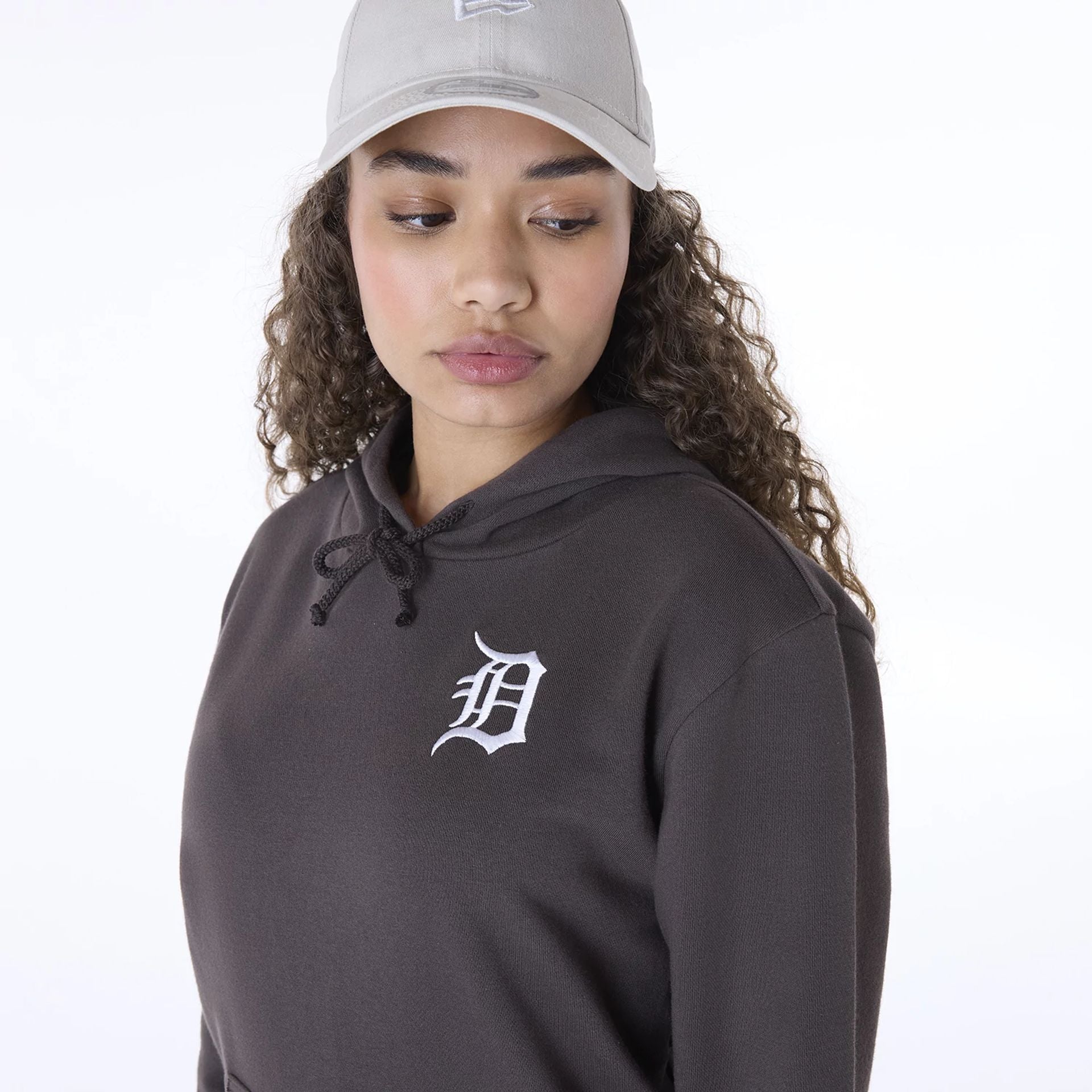 The Female model is wearing Detroit Tigers Womens MLB League Essential Dark Brown Pullover Hoodie 5