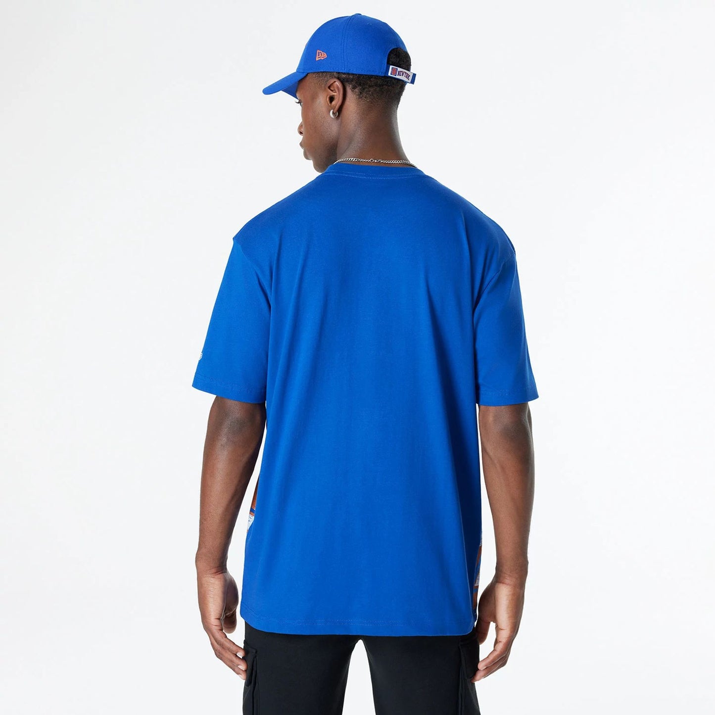 The Male model is wearing New York Knicks Sport Classic Blue T-Shirt 2