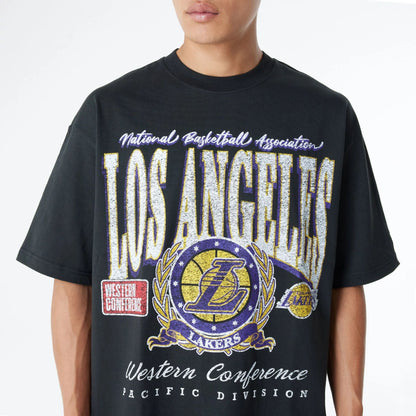 The Male model is wearing LA Lakers Oversized Essential Black Oversized T-Shirt 3