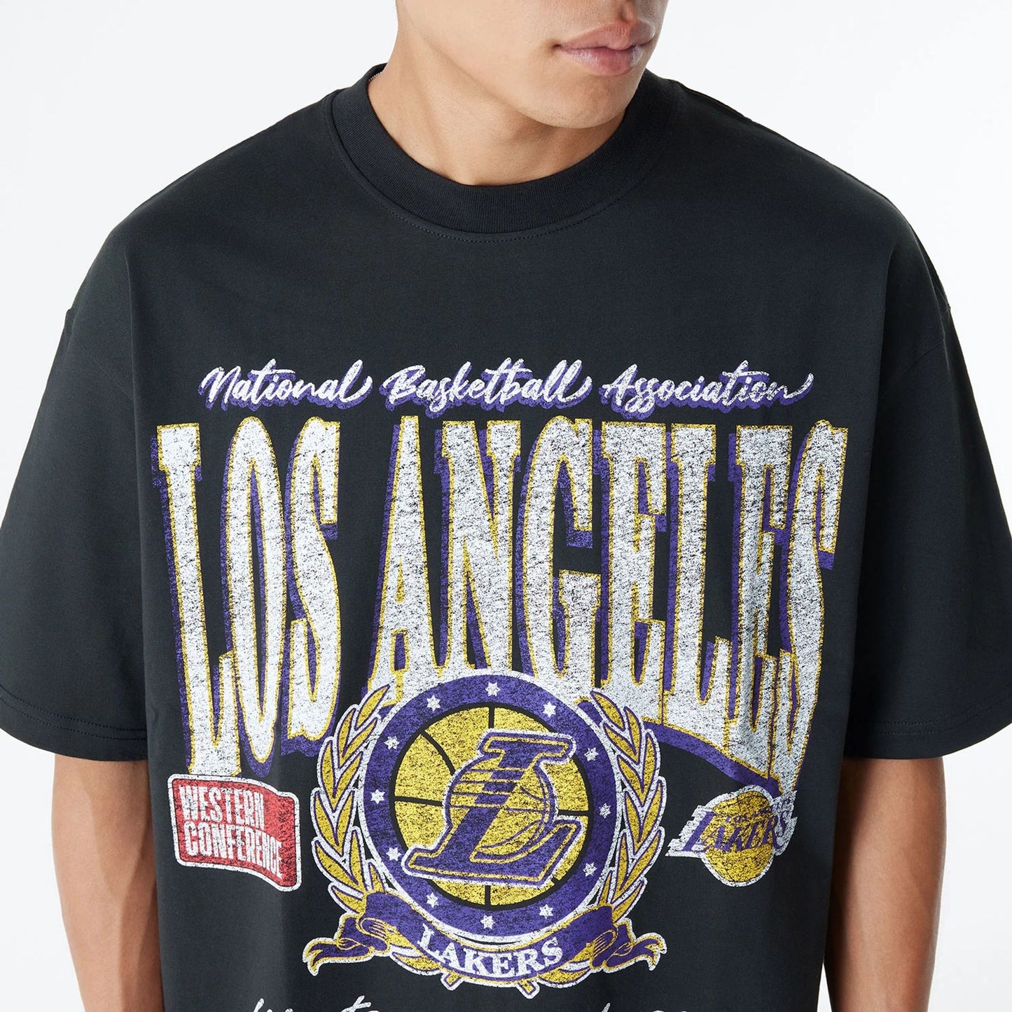 The Male model is wearing LA Lakers Oversized Essential Black Oversized T-Shirt 5