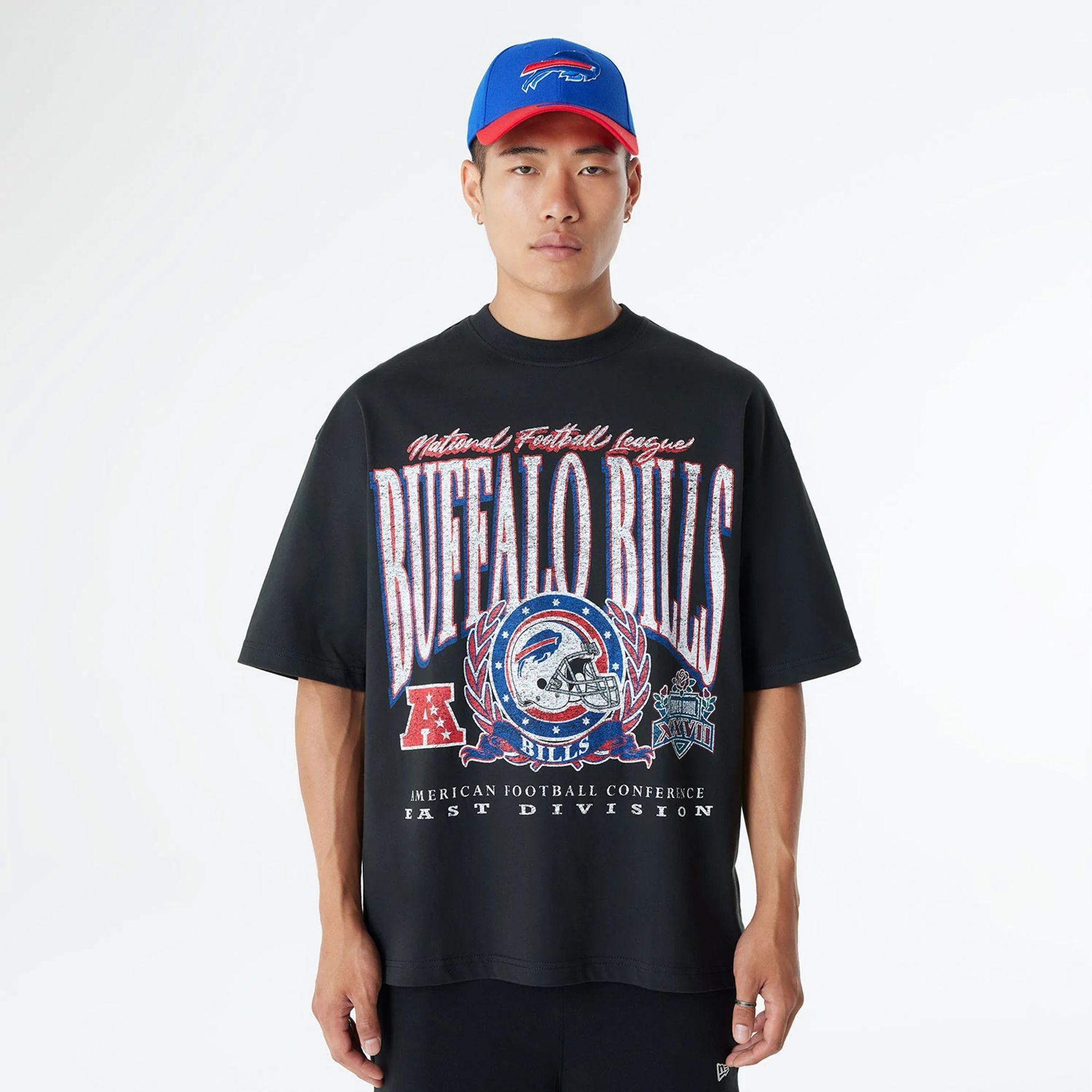 The Male model is wearing Buffalo Bills Oversized Essential Black Oversized T-Shirt 1