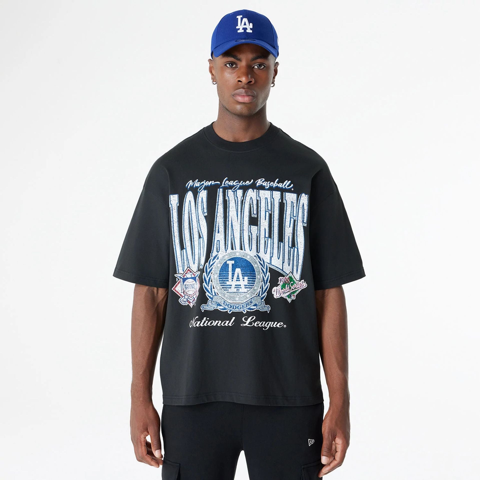 The Male model is wearing LA Dodgers Oversized Essential Black Oversized T-Shirt 1