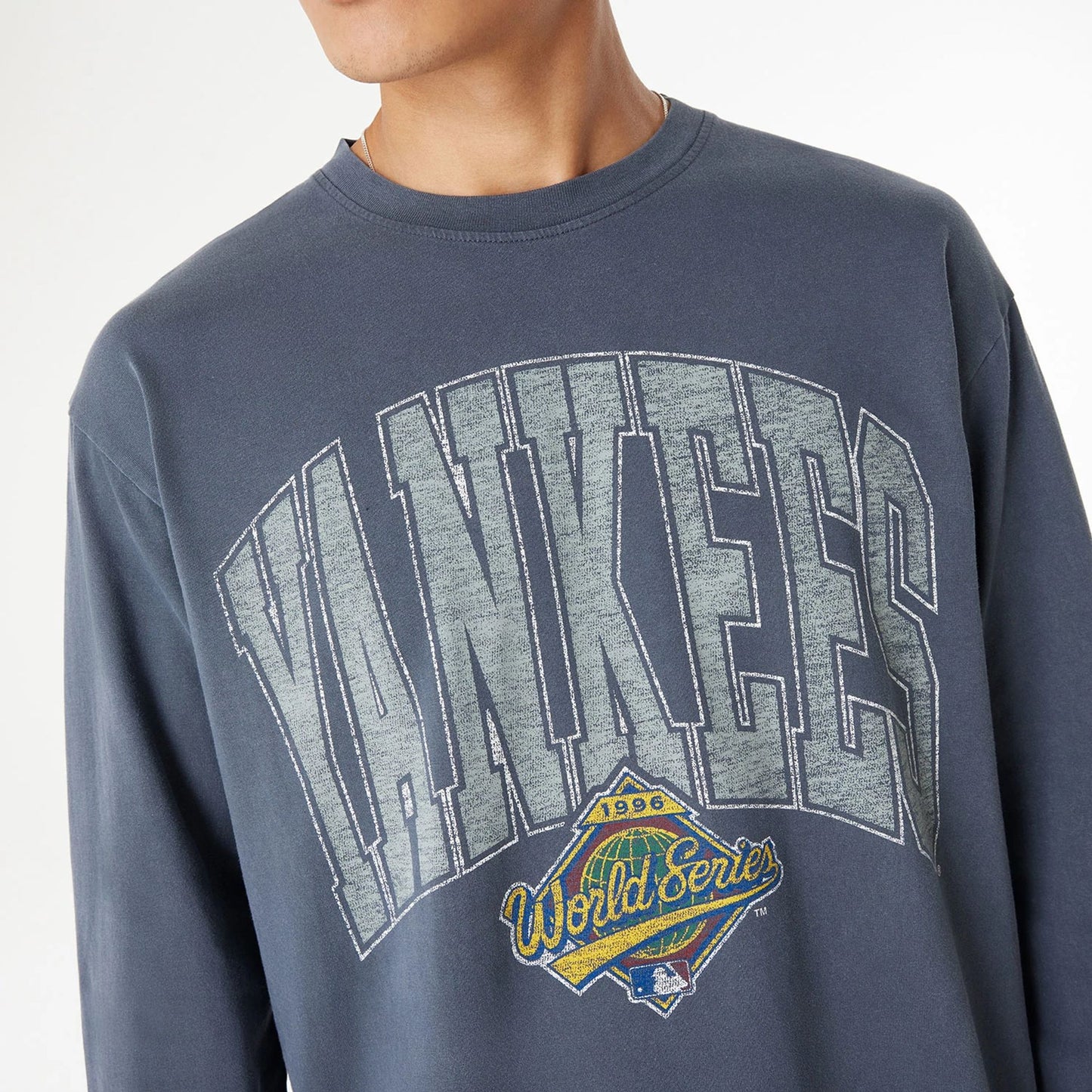 The Male model is wearing New York Yankees Oversized Essential Navy Oversized Long Sleeve T-Shirt 6