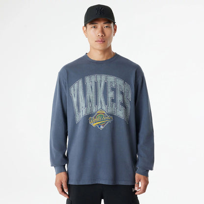 The Male model is wearing New York Yankees Oversized Essential Navy Oversized Long Sleeve T-Shirt 1