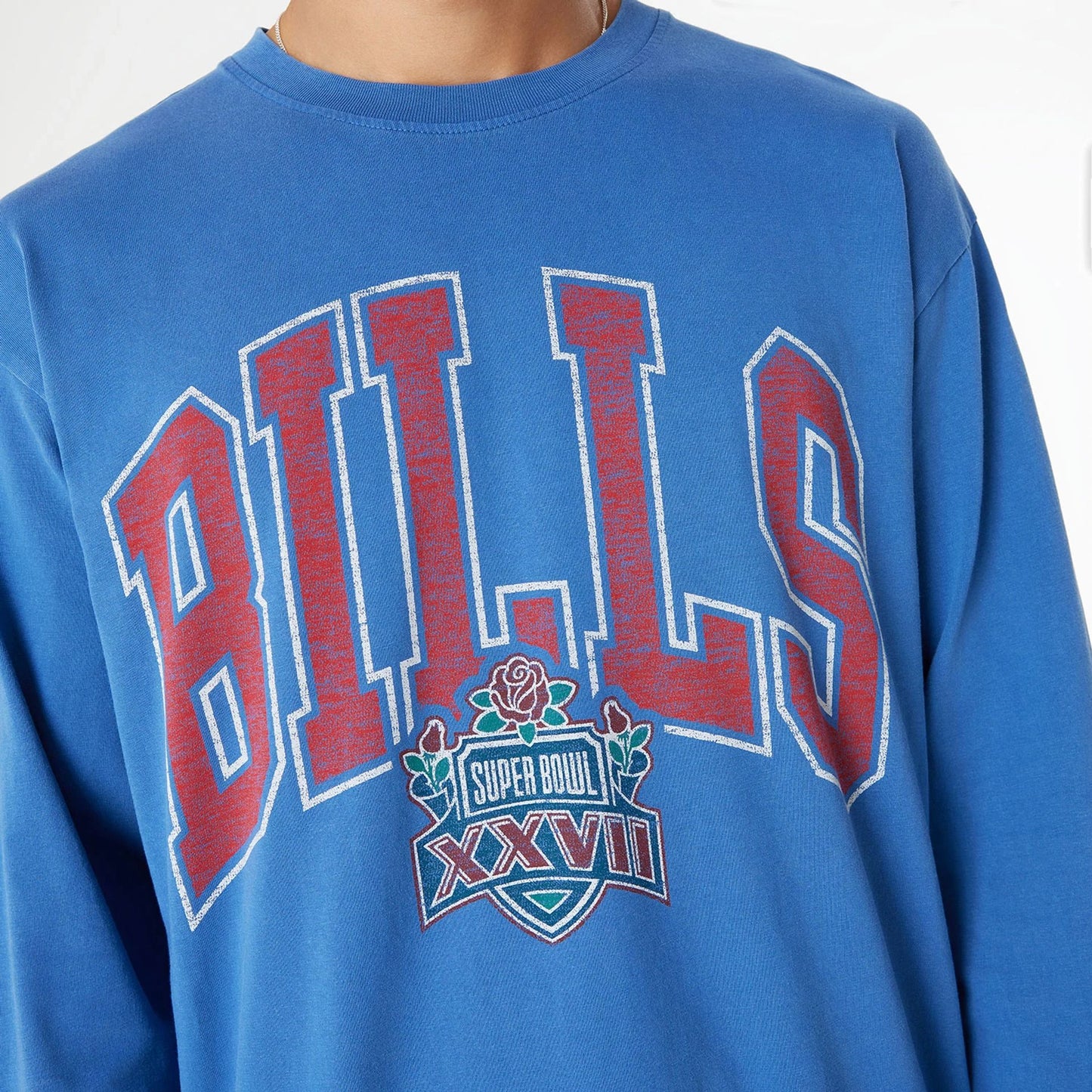 The Male model is wearing Buffalo Bills Oversized Essential Blue Oversized Long Sleeve T-Shirt 3