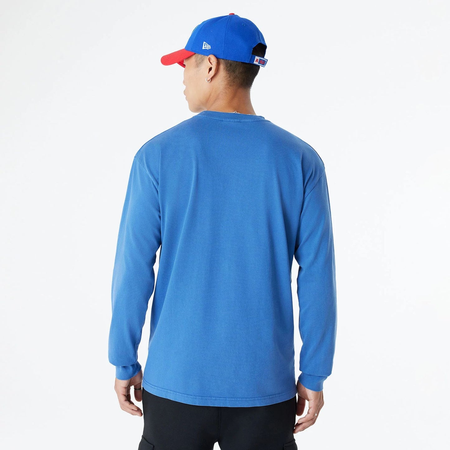 The Male model is wearing Buffalo Bills Oversized Essential Blue Oversized Long Sleeve T-Shirt 2