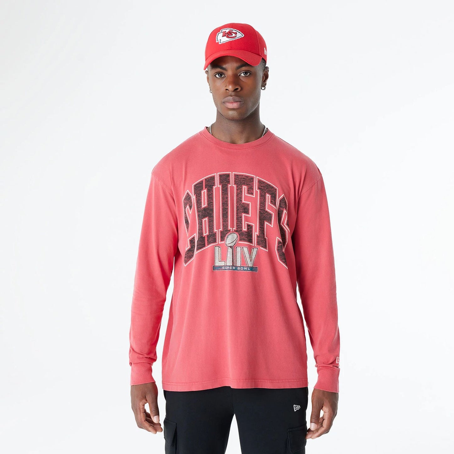 The Male model is wearing Kansas City Chiefs Oversized Essential Red Oversized Long Sleeve T-Shirt 1