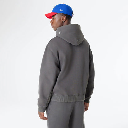 The Male model is wearing Buffalo Bills Oversized Essential Dark Grey Oversized Pullover Hoodie 2