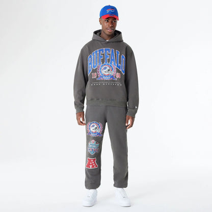 The Male model is wearing Buffalo Bills Oversized Essential Dark Grey Oversized Pullover Hoodie 7