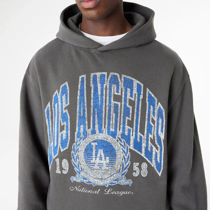 The Male model is wearing LA Dodgers Oversized Essential Dark Grey Oversized Pullover Hoodie 4