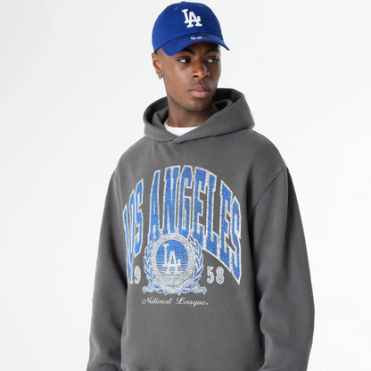 The Male model is wearing LA Dodgers Oversized Essential Dark Grey Oversized Pullover Hoodie 6