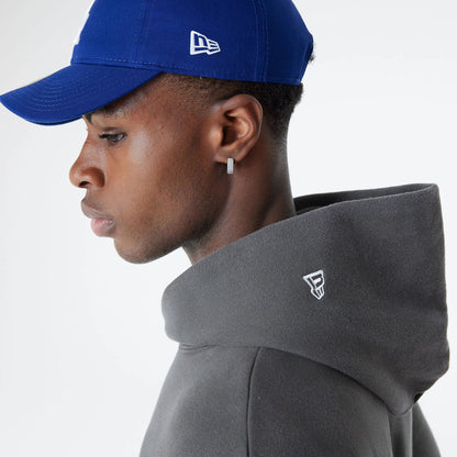 The Male model is wearing LA Dodgers Oversized Essential Dark Grey Oversized Pullover Hoodie 5