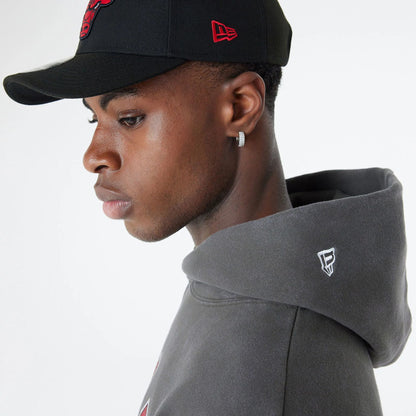 The Male model is wearing Chicago Bulls Oversized Essential Dark Grey Oversized Pullover Hoodie 6