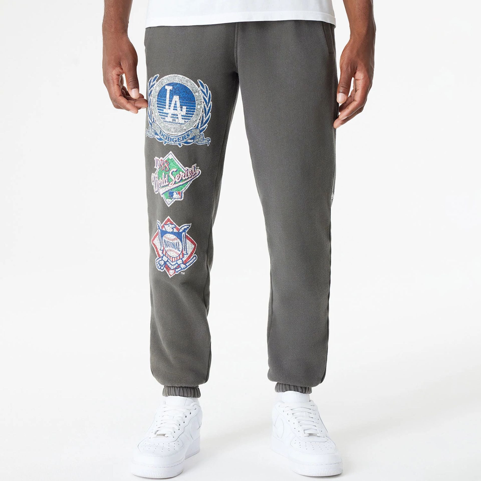 The Male model is wearing LA Dodgers Oversized Essential Dark Grey Oversized Joggers 1