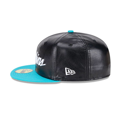 This is a Miami Dolphins Faux Leather Crown Black 59FIFTY Fitted Cap 7